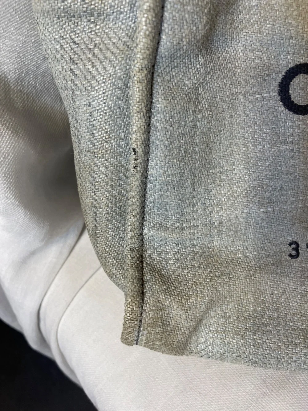 CHANEL Beige Canvas Tote with Blue Handles